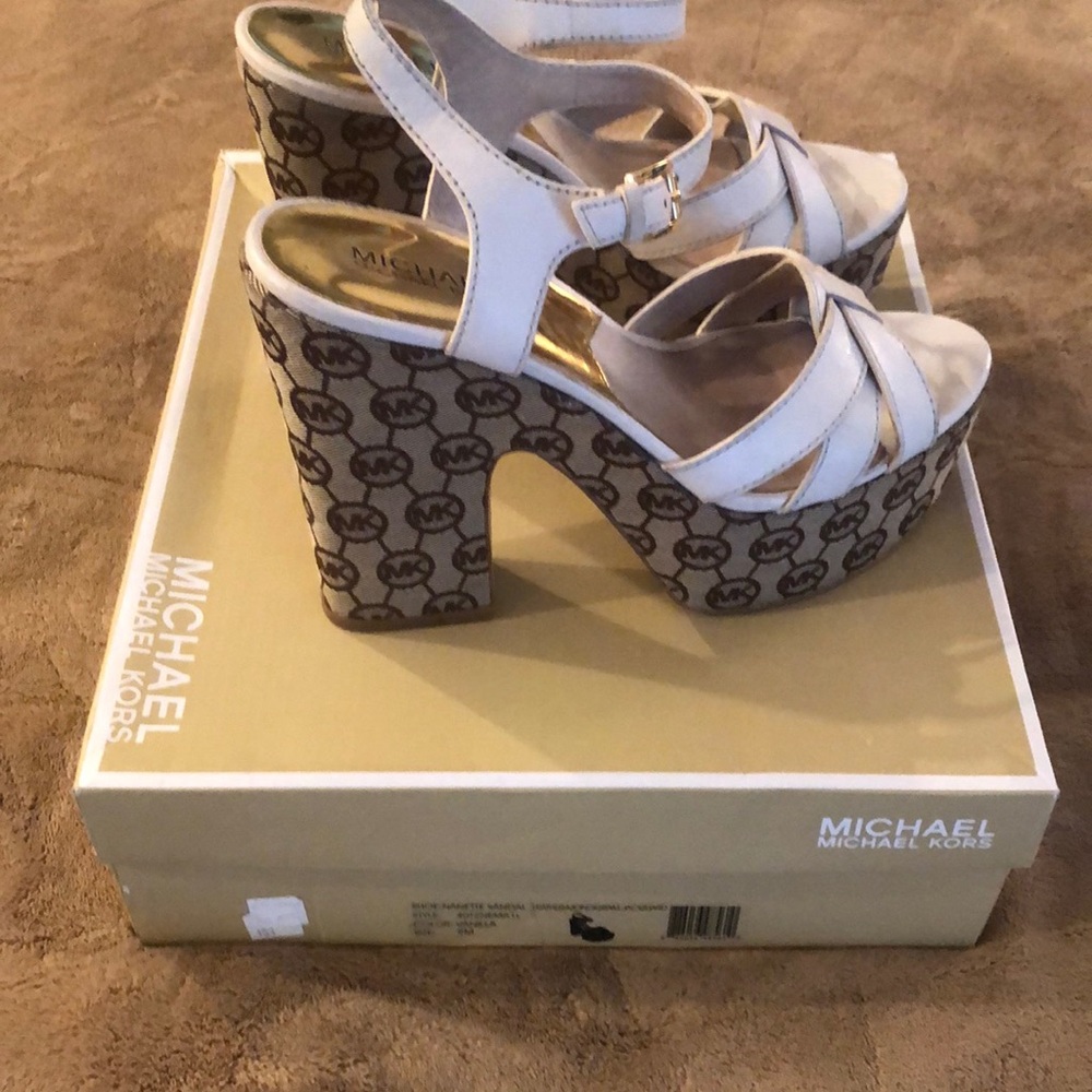 Michael Kors White Platform Shoes with MK logos.
